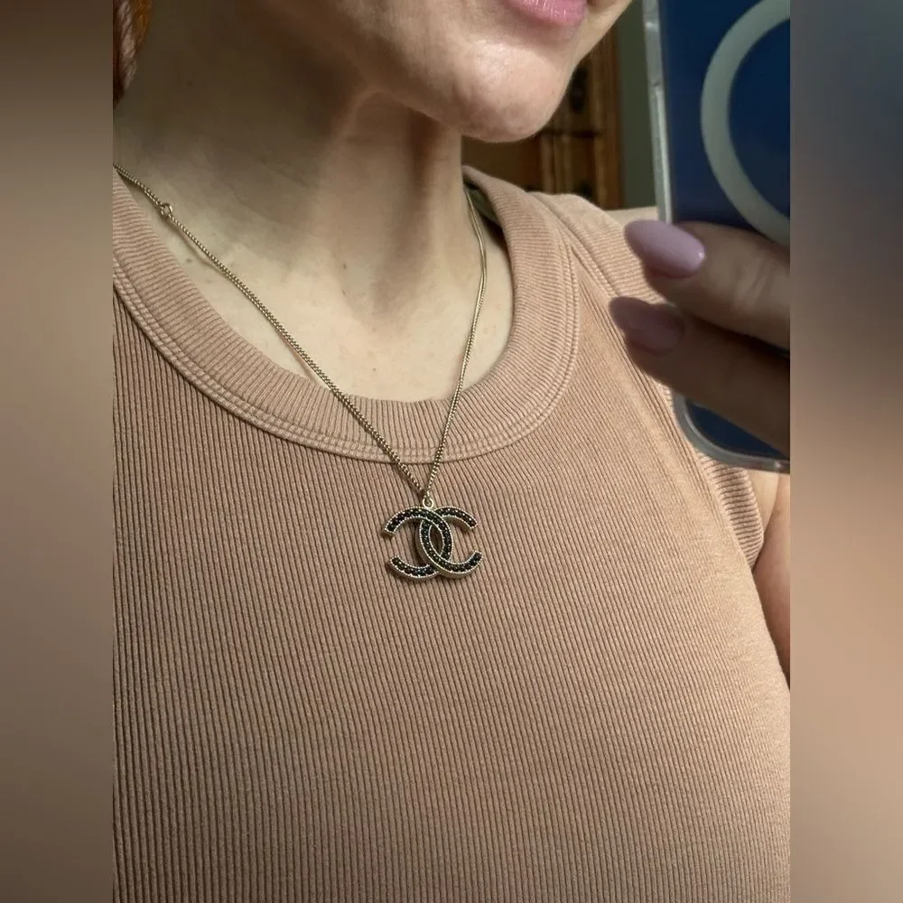 Chanel gold and black pearl CC pendant necklace, Authentic